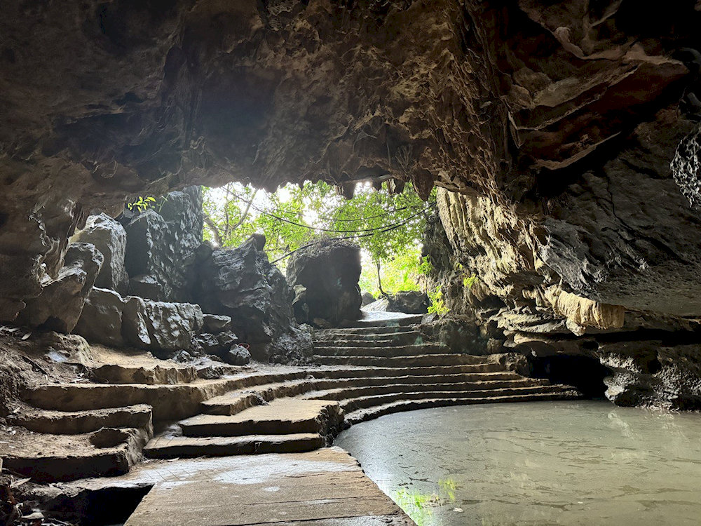 The winding path inside the cave leads visitors into an enchanting underground wonderland